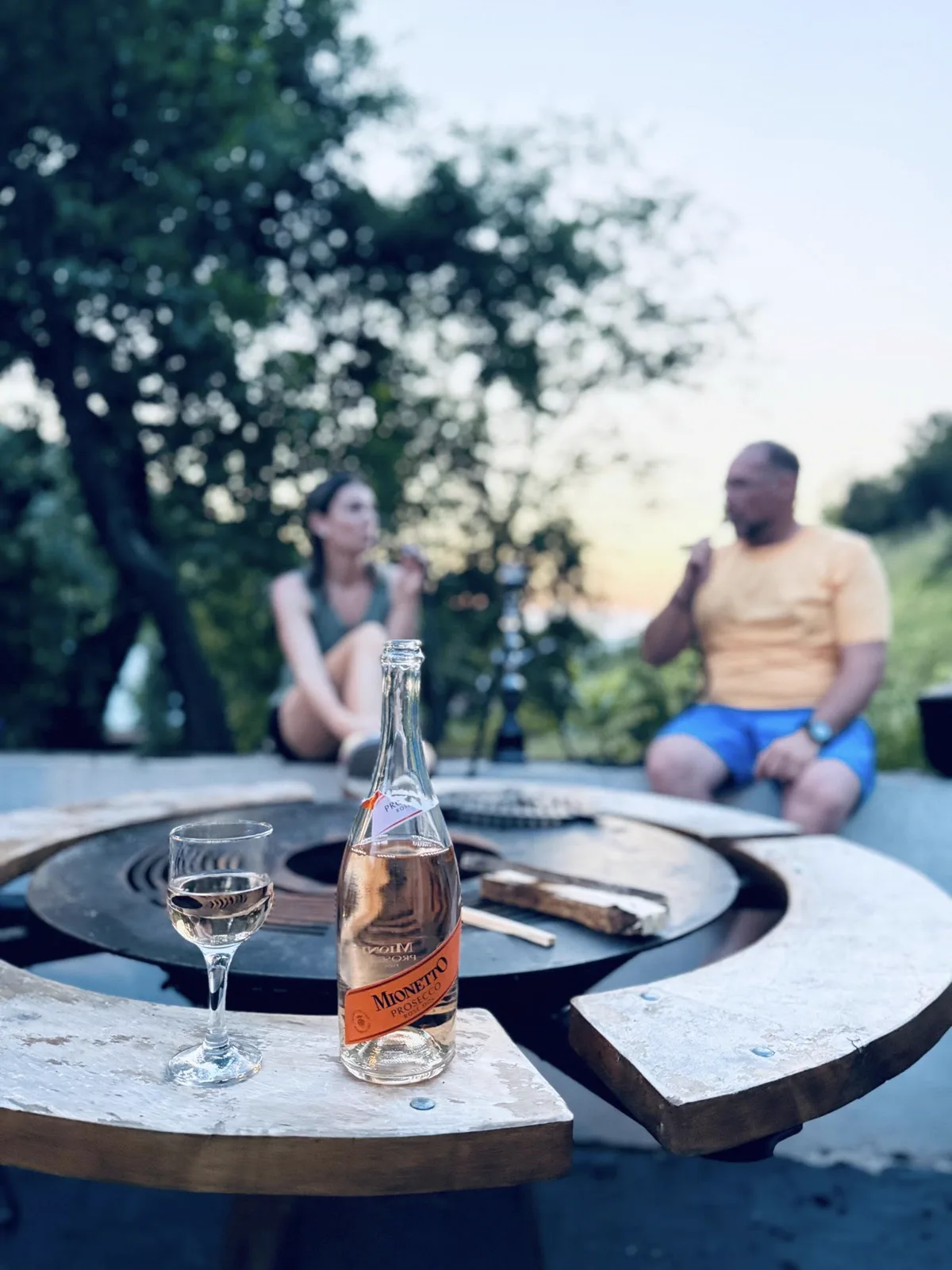Prosecco and friends at the BBQ disc at sunset